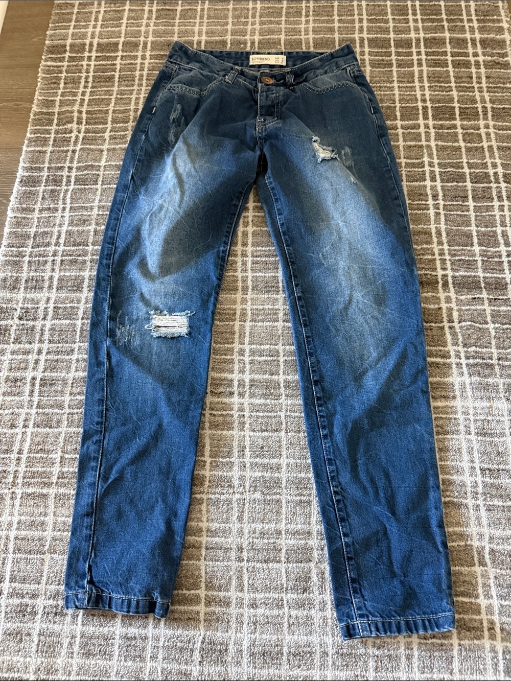 Distressed Dark Blue Jeans